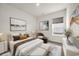 Well-lit main bedroom with neutral color palette, carpet flooring, and coordinated artwork at 476 Honeyhill Loop, Conway, SC 29526