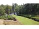 A partially flooded lot featuring lush greenery and trees along the Waccamaw River at 476 Honeyhill Loop, Conway, SC 29526