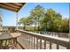 Balcony overlooking the marsh with outdoor seating and views of the landscaping at 4999 Highway 17 Business # 302, Murrells Inlet, SC 29576
