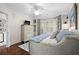 Well-lit bedroom featuring a dresser and large windows, offering a comforting space at 4999 Highway 17 Business # 302, Murrells Inlet, SC 29576