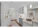 Well-lit kitchen with stainless steel appliances, white cabinets and an island sink at 4999 Highway 17 Business # 302, Murrells Inlet, SC 29576