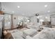 Spacious living room with views to the kitchen and dining area, creating an airy and connected living space at 4999 Highway 17 Business # 302, Murrells Inlet, SC 29576
