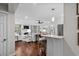 Open-concept living room flowing into the kitchen, perfect for entertaining guests and Gathering gatherings at 4999 Highway 17 Business # 302, Murrells Inlet, SC 29576