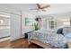 Inviting main bedroom with a plush bed, stylish decor, and ensuite bathroom access at 4999 Highway 17 Business # 302, Murrells Inlet, SC 29576