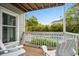 Relaxing porch with chairs overlooking the pool, perfect for outdoor enjoyment at 4999 Highway 17 Business # 302, Murrells Inlet, SC 29576