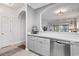 Open-concept kitchen showcasing quartz counters, stainless steel dishwasher, and easy access to living areas at 5750 Oyster Catcher Dr. # 714, North Myrtle Beach, SC 29582