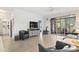Living room featuring a large sliding glass door to a porch with modern decor at 5750 Oyster Catcher Dr. # 714, North Myrtle Beach, SC 29582