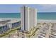 Expansive aerial view of an oceanfront high-rise building with RV park, pool and beach access at 5905 S Kings Hwy. # 1612, Myrtle Beach, SC 29575
