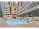 Bright indoor pool with lounge seating and colorful decor at 5905 S Kings Hwy. # 1612, Myrtle Beach, SC 29575