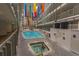 Bright, modern indoor pool area with spa and plenty of seating at 5905 S Kings Hwy. # 1612, Myrtle Beach, SC 29575