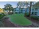 A putting green and lush landscaping surround these lovely condos at 5905 S Kings Hwy. # 1612, Myrtle Beach, SC 29575