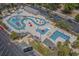 Aerial view of a community water park with lazy river, playground, and swimming pool at 5905 S Kings Hwy. # 1612, Myrtle Beach, SC 29575