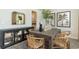 Modern dining room featuring stylish chairs, a buffet and light wood flooring at 615 Forage Dr, Conway, SC 29526