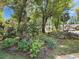 The landscaped surroundings of this house offer a lush green and pleasant living environment at 64 Reef Run Rd., Pawleys Island, SC 29585