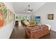 Spacious living room with hardwood floors, vaulted ceilings, and comfortable seating at 64 Reef Run Rd., Pawleys Island, SC 29585