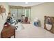 Versatile office space with ample natural light and neutral carpet at 64 Reef Run Rd., Pawleys Island, SC 29585