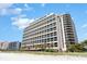 Beautiful beachfront condo featuring palm trees, beach access, and multiple floors at 7100 N Ocean Blvd. N # 912, Myrtle Beach, SC 29572