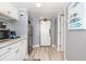Efficient kitchenette with stainless steel appliances, granite countertops, and stylish backsplash at 7100 N Ocean Blvd. N # 912, Myrtle Beach, SC 29572