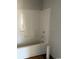 A clean and ready-to-use tub and shower combination with bright white walls at 8050 Mill Pond Rd., Galivants Ferry, SC 29544