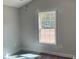Bright bedroom featuring a window offering lots of natural light and a contemporary ceiling fan at 8050 Mill Pond Rd., Galivants Ferry, SC 29544