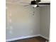 Bedroom featuring ceiling fan, base molding, and neutral paint; perfect for comfort and style at 8050 Mill Pond Rd., Galivants Ferry, SC 29544