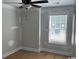 Bedroom with natural light, ceiling fan, and neutral paint at 8054 Mill Pond Rd., Galivants Ferry, SC 29544