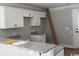 Kitchen featuring white cabinets, granite countertops, and modern fixtures at 8058 Mill Pond Rd., Galivants Ferry, SC 29544