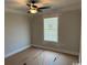 Bedroom with a ceiling fan and a window, creating a cozy and comfortable atmosphere at 8062 Mill Pond Rd., Galivants Ferry, SC 29544