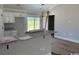Inviting kitchen featuring white cabinetry, granite counters, and ample space for cooking and entertaining at 8062 Mill Pond Rd., Galivants Ferry, SC 29544