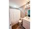 Bathroom featuring a bright shower curtain, neutral walls, and tile floors at 897 Wild Leaf Loop, Conway, SC 29526