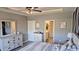 Comfortable bedroom features neutral colors, furnishings, a walk-in closet, and ample natural light at 897 Wild Leaf Loop, Conway, SC 29526