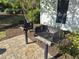 Outdoor grilling area with brick pavers offers residents a convenient space to cook and socialize outdoors at 897 Wild Leaf Loop, Conway, SC 29526
