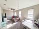 Comfortable upstairs living room with plush carpeting and plenty of natural light at 897 Wild Leaf Loop, Conway, SC 29526