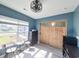 Bright office with large window and light, hard surface floors, and storage closet with barn doors at 897 Wild Leaf Loop, Conway, SC 29526