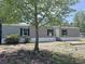 Charming single-story home showcasing a lush front yard at 928 Baron Ln., North Myrtle Beach, SC 29582