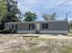 Charming single-story home showcasing a lush front yard at 928 Baron Ln., North Myrtle Beach, SC 29582