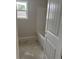 Clean, unfinished bathroom space with a window, awaiting your personal touch in a new home at Tbd 61 Persimmon Rd., Aynor, SC 29511