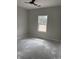 Bright, unfinished bedroom with a ceiling fan, ready for customization in a new construction home at Tbd 61 Persimmon Rd., Aynor, SC 29511