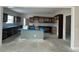 Open-concept kitchen featuring an island and modern cabinets, ready for personalization in a new home at Tbd 61 Persimmon Rd., Aynor, SC 29511