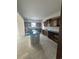 Kitchen with dark wood cabinets and island, awaiting finishing touches at Tbd 61 Persimmon Rd., Aynor, SC 29511