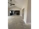 Open concept kitchen featuring a central island with dark cabinetry and modern layout at Tbd 61 Persimmon Rd., Aynor, SC 29511