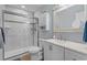 Bright bathroom featuring a glass shower and a white vanity with updated fixtures at 10301 N Kings Hwy. # 8-1, Myrtle Beach, SC 29572