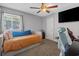 This secondary bedroom has a bed with a daybed and a desk setup at 10301 N Kings Hwy. # 8-1, Myrtle Beach, SC 29572