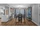 Dining area with wood table, padded chairs, stylish lighting, and built-in display at 10301 N Kings Hwy. # 8-1, Myrtle Beach, SC 29572