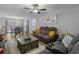 Bright living room open to dining area, featuring contemporary furnishings and decor at 10301 N Kings Hwy. # 8-1, Myrtle Beach, SC 29572