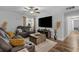 Comfortable living room featuring modern furniture, a large TV, and a ceiling fan at 10301 N Kings Hwy. # 8-1, Myrtle Beach, SC 29572