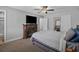 Spacious bedroom featuring a fireplace, ceiling fan, and ample closet space at 10301 N Kings Hwy. # 8-1, Myrtle Beach, SC 29572