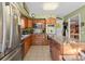 Kitchen featuring stainless steel appliances, granite countertops, an island, and stylish cabinetry at 111 Cedar Ridge Ln., Conway, SC 29526