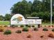 Myrtle Trace retirement community sign amid landscaped grounds at 111 Cedar Ridge Ln., Conway, SC 29526