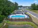 Aerial shot of community pool and surrounding neighborhood with pond at 1222 Nw Calabash Station Blvd., Calabash, NC 28467